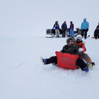 Fun in the snow on the Hardangerfjord in a nutshell winter tour by Fjord Tours - Eidfjord, Norway
